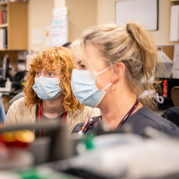 Students discovering healthcare jobs at CHAS Health